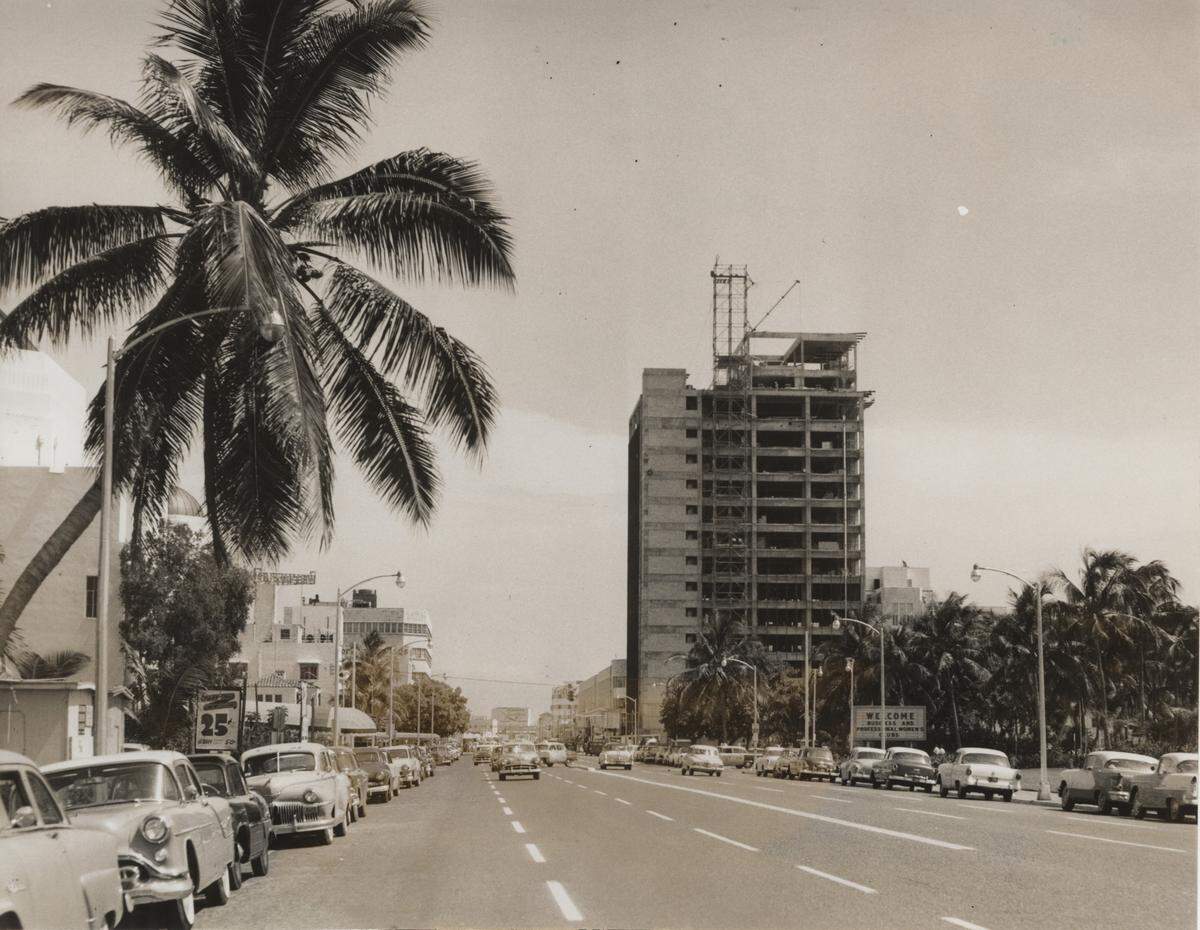July 2, 1956: Tallest building on Miami Beach is the new, 14-story home of the Miami Beach Federal Savings and Loan Association. Located at the foot of Lincoln Road, this picture, taken from the northern part of Washington Avenue, shows the change of scenery in the vicinity of Miami Beach Auditorium.