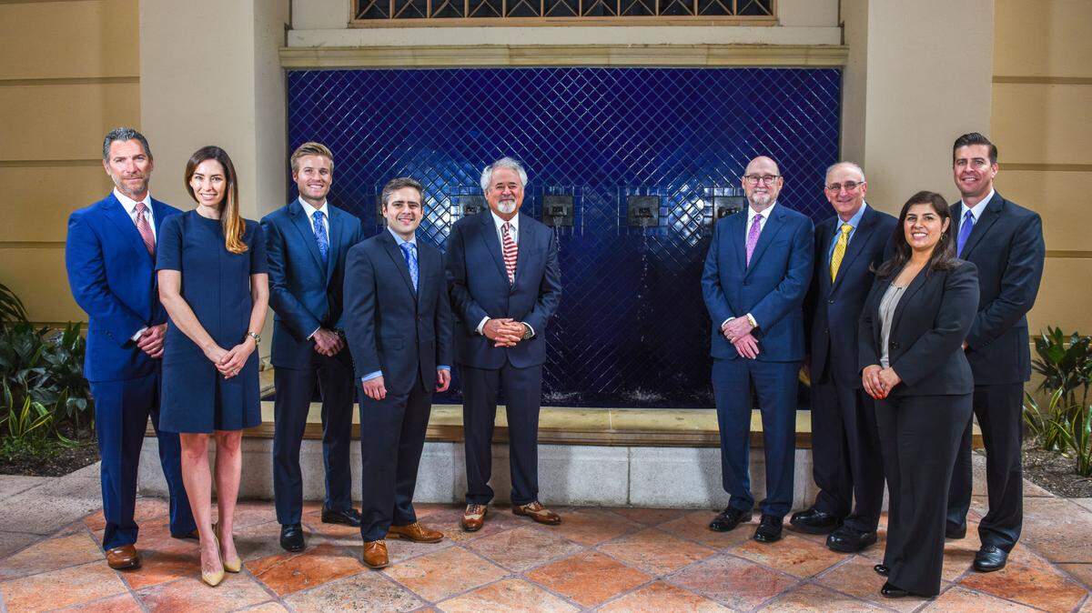 From left: Andrew Yaffa, Rachel Furst, William Mulligan, Alex Arteaga Gomez, Stuart Grossman, Gary Cohen, Neal Roth, Natasha Cortes and Eric Halsey of Grossman Roth Yaffa Cohen. Photograph by Christina Mendenhall.