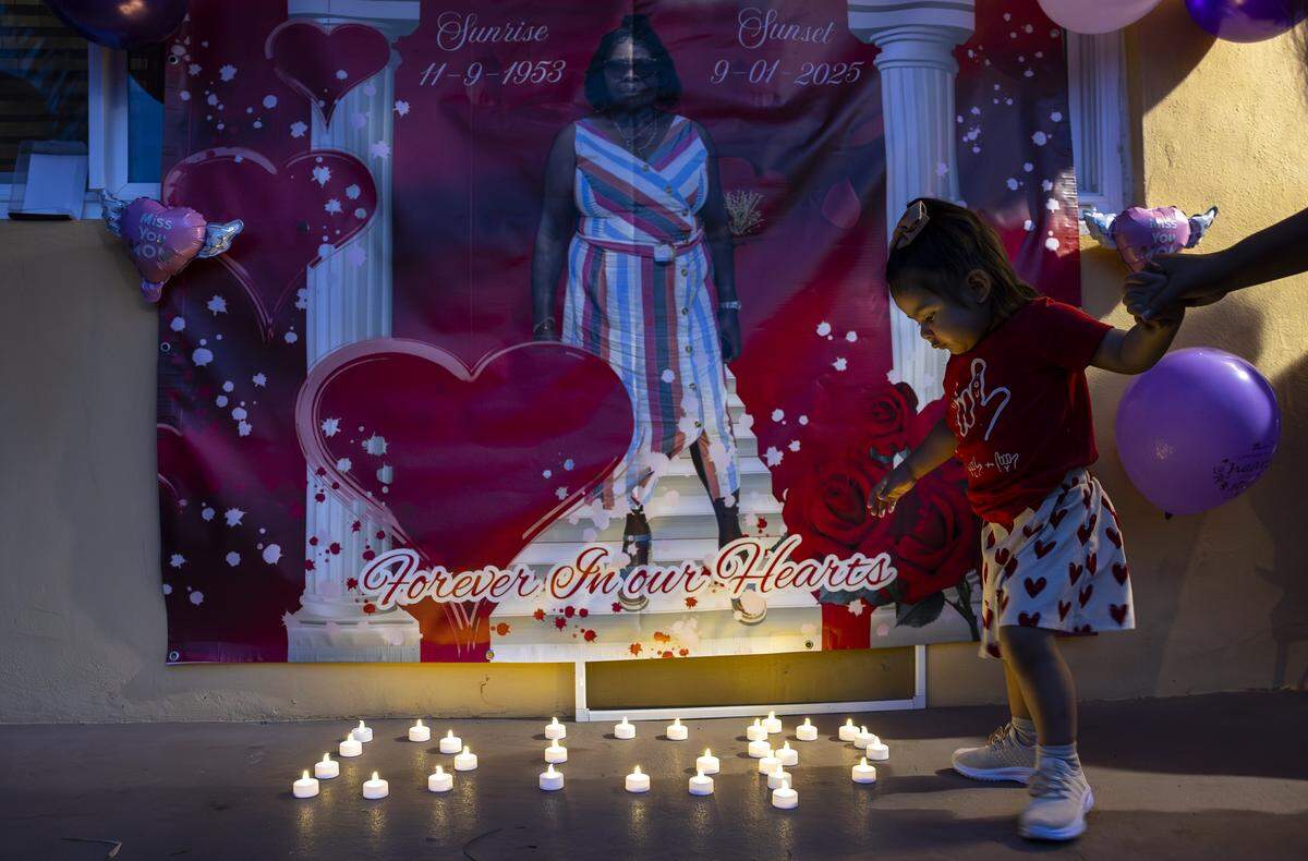 Delilah, 2, attends a vigil for the late Doreen Richards Broadbelt on Tuesday, Sept. 9, 2025, in Miami Gardens, Fla. Broadbelt, 71, was walking to her job at Walmart when a dog attacked and fatally mauled her near her home on Labor Day, police said.