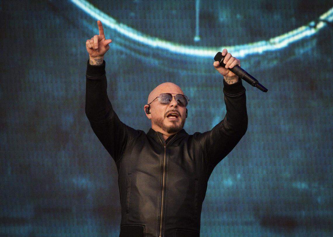 Pitbull performs at the Allstate Championship Tailgate at the stadium before the College Football Playoff National Championship Game at Hard Rock Stadium on Monday, Jan. 19, 2026 in Miami Gardens, Fla.