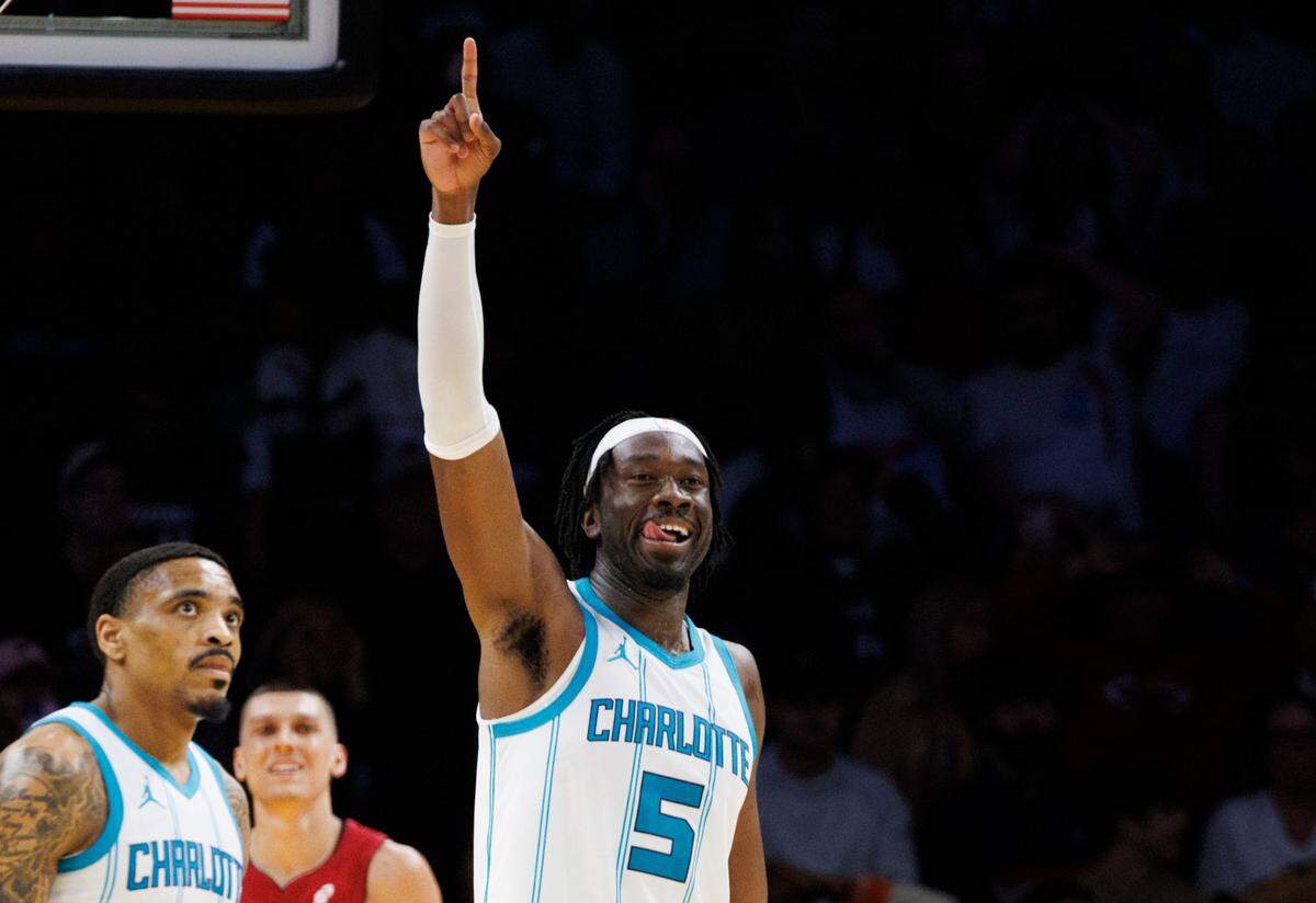 Charlotte Hornets center Mark Williams (5) points to the sky after scoring during the last minute a game against the Miami Heat on Monday, March 10, 2025, at the Kaseya Center in downtown Miami, Fla. The Hornets won in the last few seconds of the game.