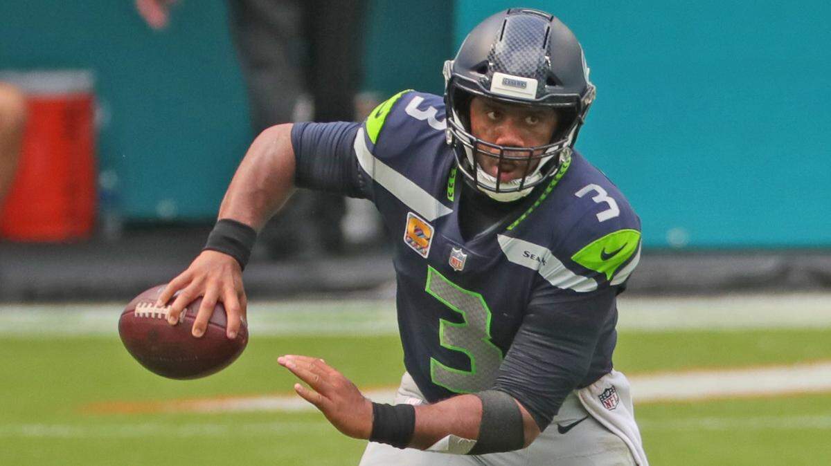 Seattle Seahawks and quarterback Russell Wilson host the Los Angeles Rams in a big NFC West matchup on Thursday Night Football to kick off NFL Week 5 this week. (Wilson is pictured facing the Dolphins at Hard Rock Stadium on October 4, 2020).