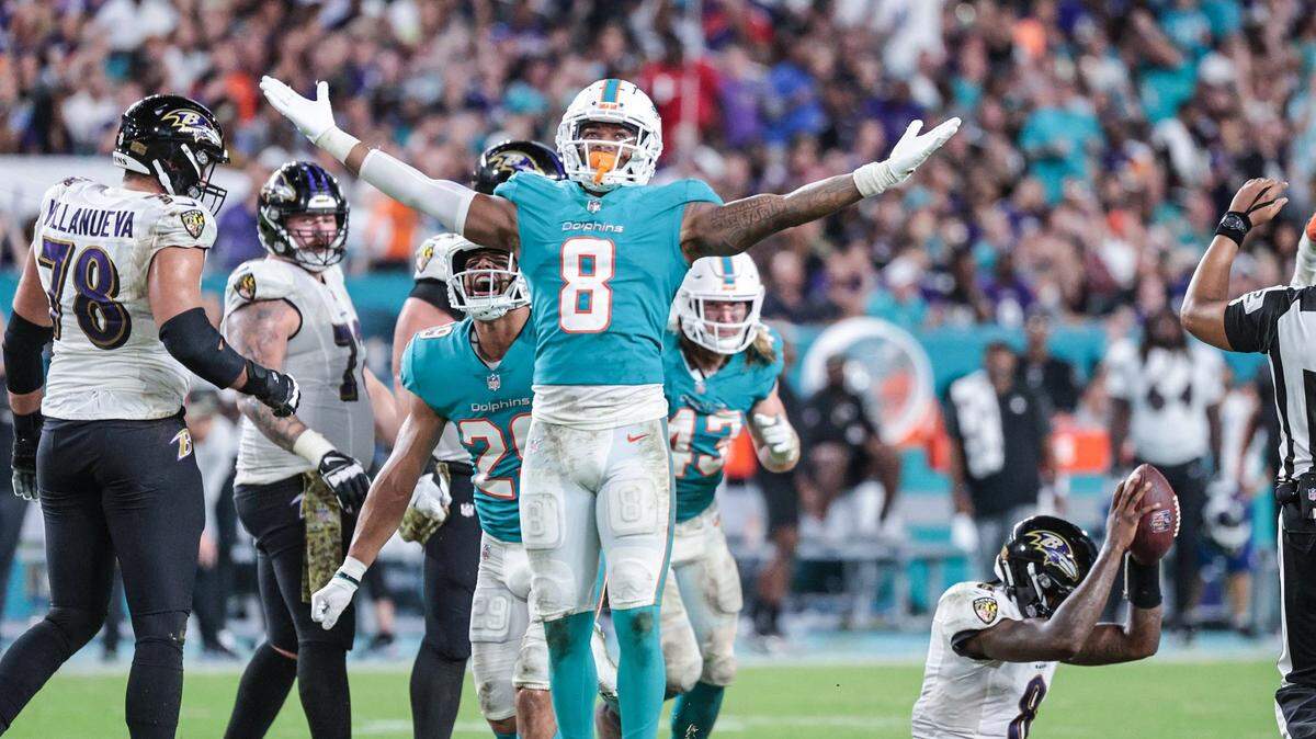 Miami Dolphins free safety Jevon Holland (8) reacts after Baltimore Ravens quarterback Lamar Jackson (8) is sacked in the second half at Hard Rock Stadium on Thursday, November 11, 2021