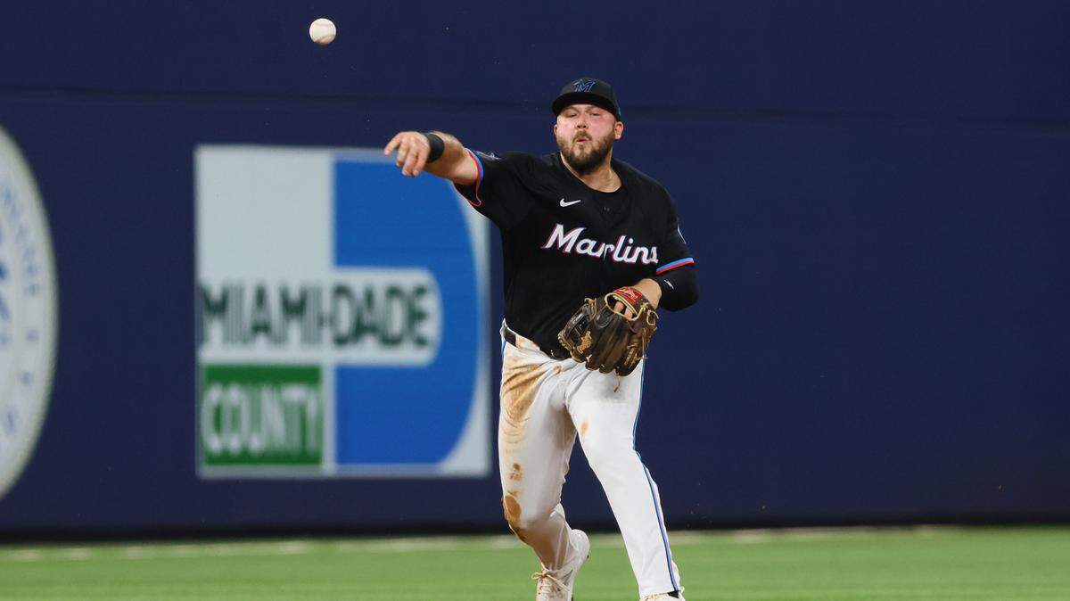 Jul 5, 2024; Miami, Florida, USA; Miami Marlins third baseman Jake Burger (36) throws to first base to retire Chicago White Sox first baseman Andrew Vaughn (not pictured) during the fifth inning at loanDepot Park.