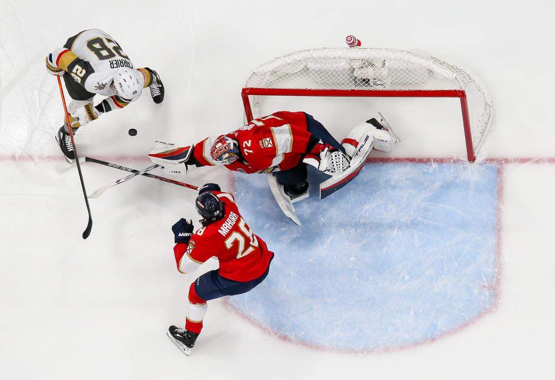 Florida Panthers goaltender Sergei Bobrovsky (72) and defenseman Josh Mahura (28) work to block a shot by Vegas Golden Knights left wing William Carrier (28) in Game 3 of the NHL Stanley Cup Final at the FLA Live Arena on Thursday, June 8, 2023, in Sunrise, Fla.
