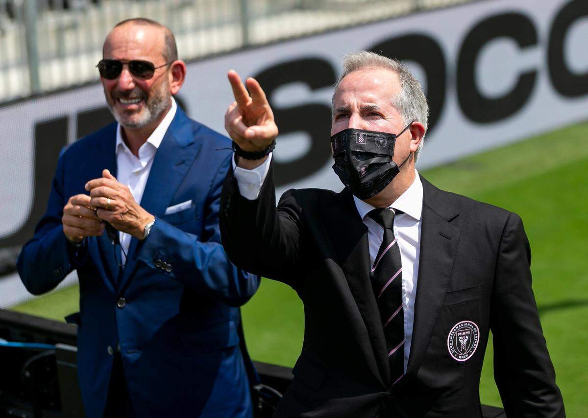 Inter Miami CF Co-owner Jorge Mas, right, and MLS Commissioner of Major League Soccer Don Garber, left, greet fans before the start of an MLS soccer match between Inter Miami and Los Angeles Galaxy at the DRV PNK Stadium on Sunday, April 18, 2021, in Fort Lauderdale, Florida.