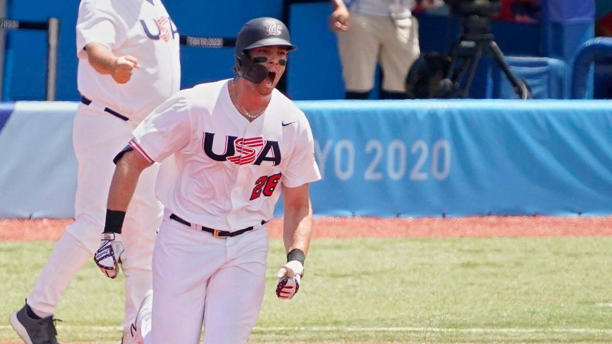 United States’ Triston Casas (26) shouts as he rounds first base after hitting a home run in the first inning of a baseball game against the Dominican Republic at the 2020 Summer Olympics, Wednesday, Aug. 4, 2021, in Yokohama, Japan.