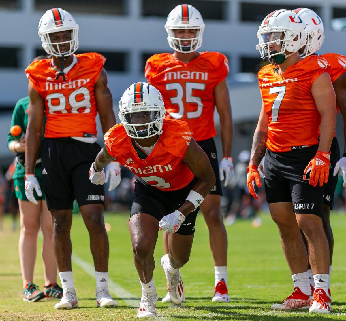 Miami Hurricanes wide receiver Frank Ladson (8) runs practice drills with his team at the University of Miami’s Greentree Practice Fields in Coral Gables, Florida on Monday, March 7, 2022.