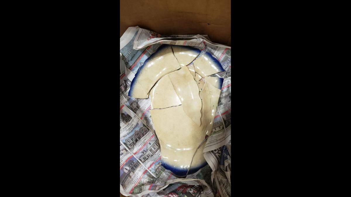 Phyllis Dixon said this was one of several plates that were smashed by All Time Moving.