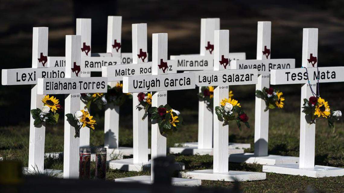Crosses with the names of Tuesday’s shooting victims stand outside Robb Elementary School in Uvalde, Texas.
