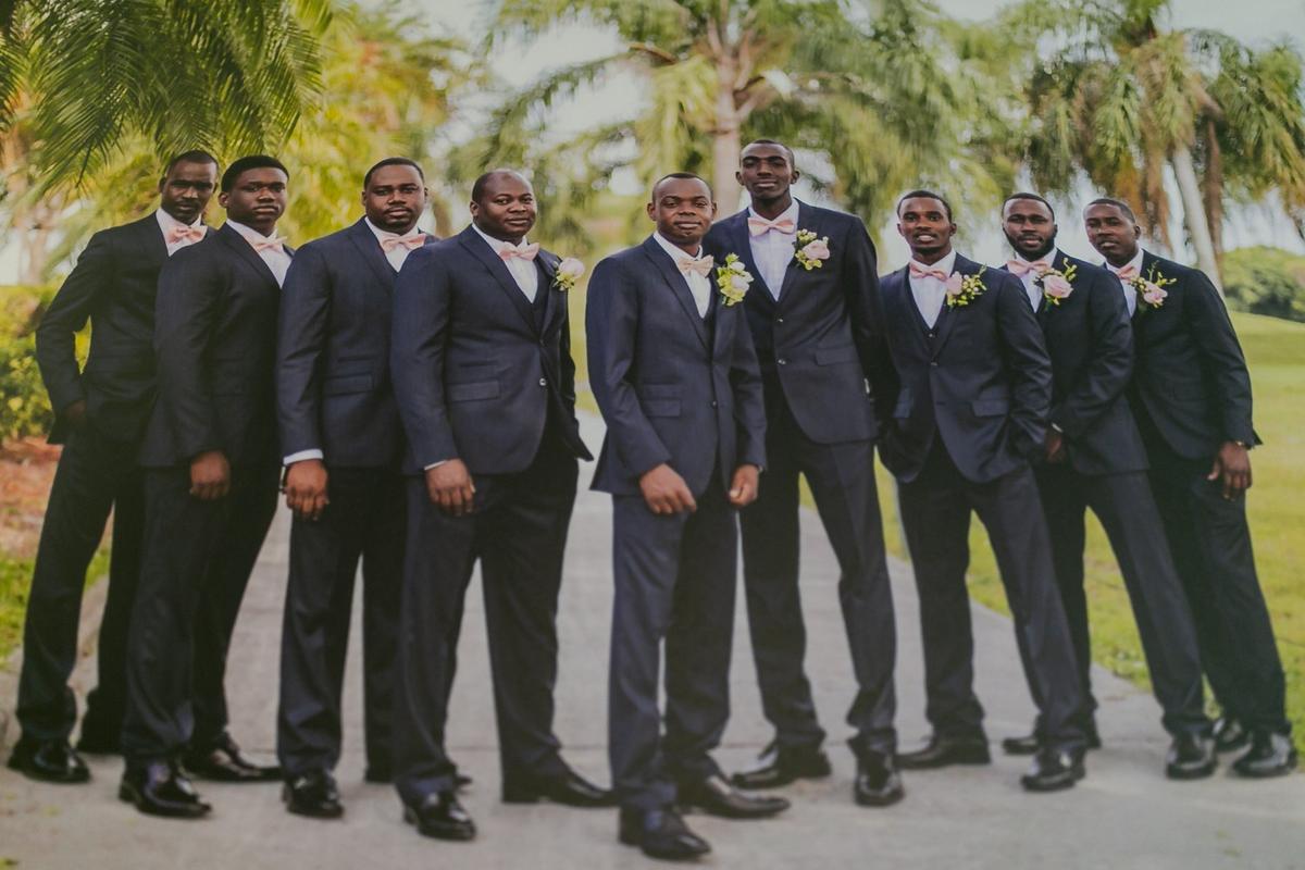 A photograph of Frantz Roseus, center, during his wedding is seen at his home in Miramar, Florida on Saturday, December 14, 2019. Frantz has no working kidneys and faces millions in medical debt due to complications from his transplant surgery.
