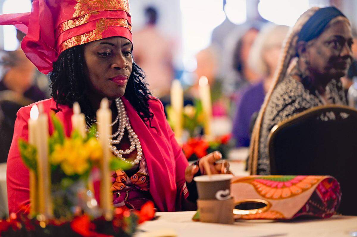 Nyemah Abrams sits at a table at the second annual “Breaking Bread/Breaking Bias” interfaith potluck organized by Temple Beth Am, Unity on the Bay, Mosaic Miami and other religious partners. Attendees were led through a guided discussion — answering questions that encouraged dialogue and openness.