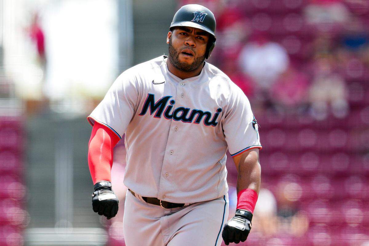 Miami Marlins’ Jesus Aguilar rounds the bases after hitting a two-run home run during the third inning of a baseball game against the Cincinnati Reds, Thursday, July 28, 2022, in Cincinnati. (AP Photo/Jeff Dean)