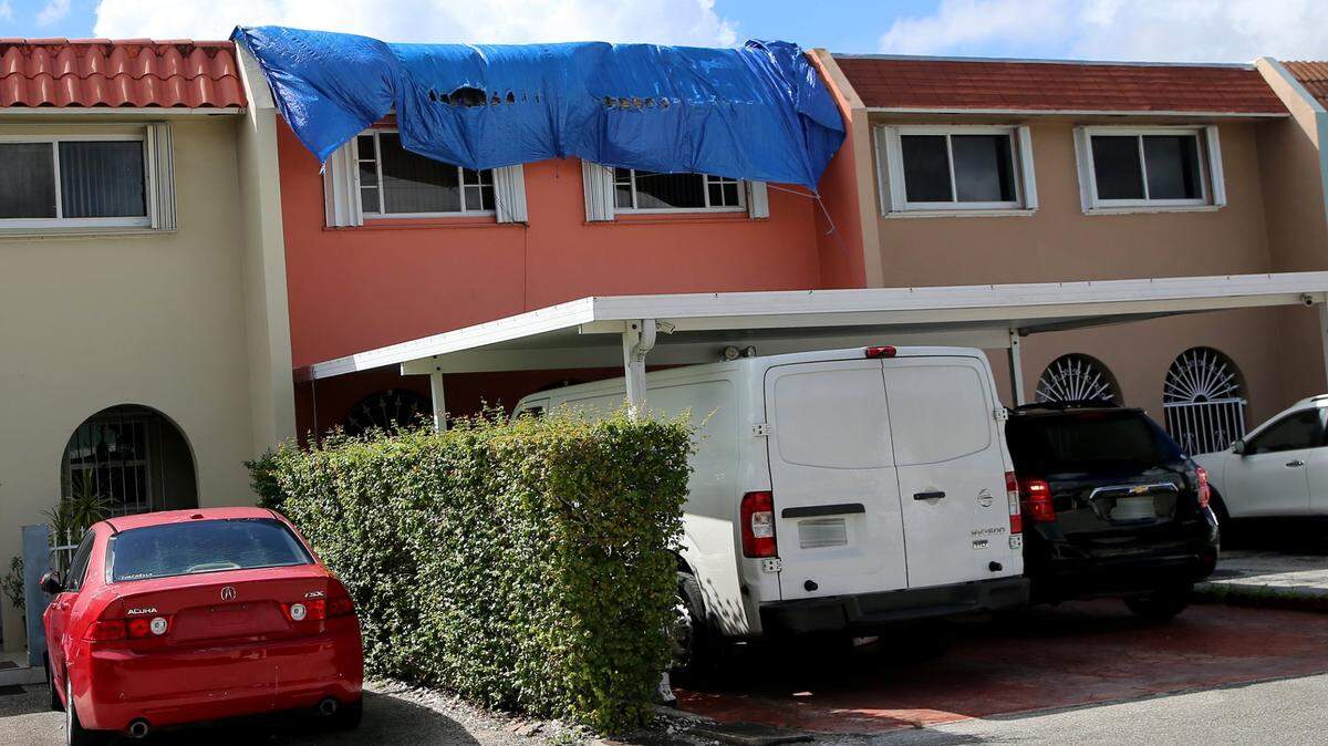 This is the sight no Florida homeowner ever wants to see. A tarp covers a leaky roof in Hialeah on Thursday, October 6, 2020.