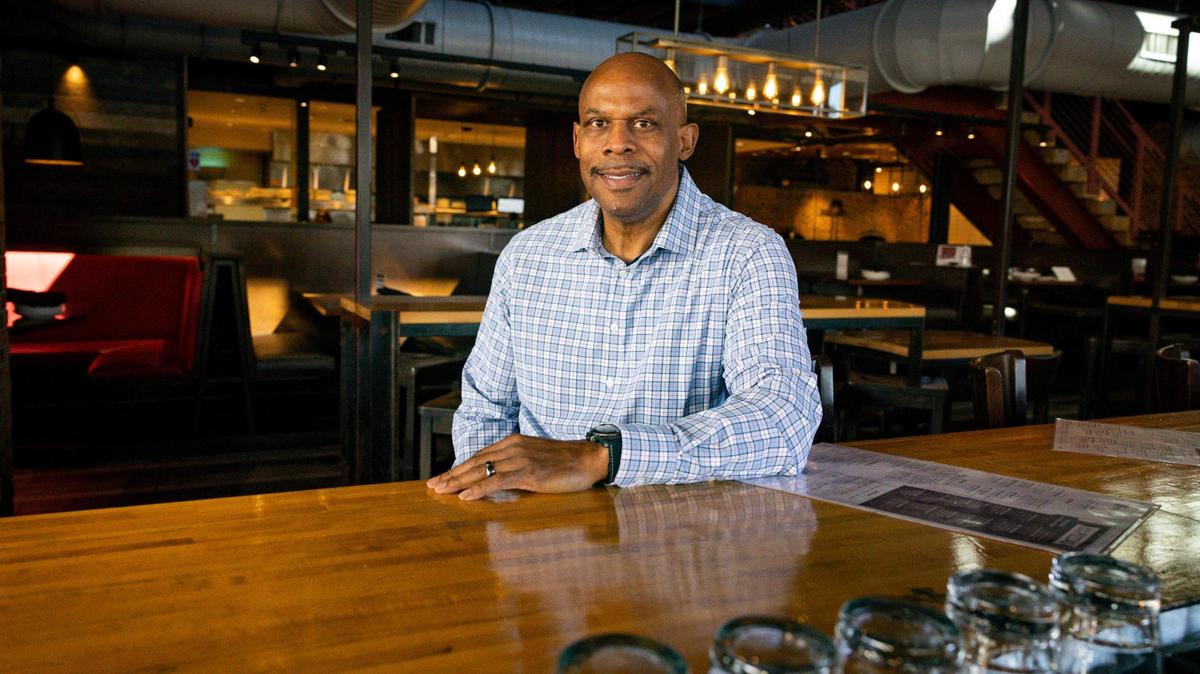 Warren Thompson, founder of Thompson Hospitality, poses inside his company’s Matchbox restaurant on Wednesday, Jan. 31, 2024, at Sawgrass Mills in Sunrise. Thompson, whose great-great-grandfather was a slave and whose father had great dreams for him, is oriented around keeping business in the family and employs his sister, his brother and his nephew.
