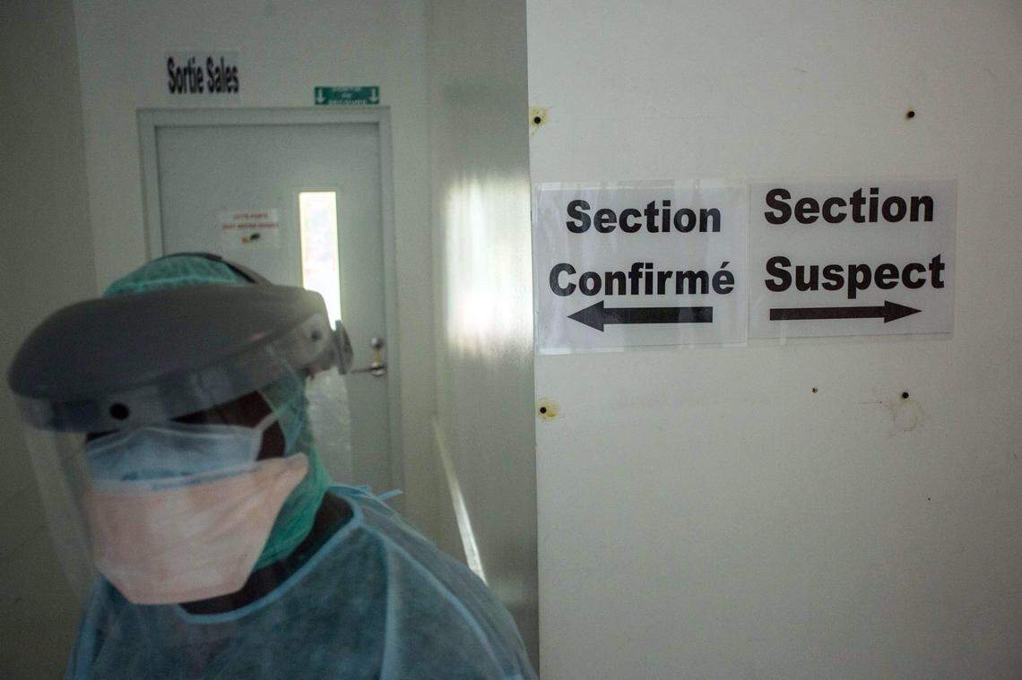 Dr. Erneau Mondesir walks in the corridors of the Doctors Without Borders Drouillard Hospital in Cite Soleil, Haiti, on June 3, 2020. “The illness is real. Many of our citizens are experiencing respiratory symptoms and other tell-tale signs,” said Mondesir.
