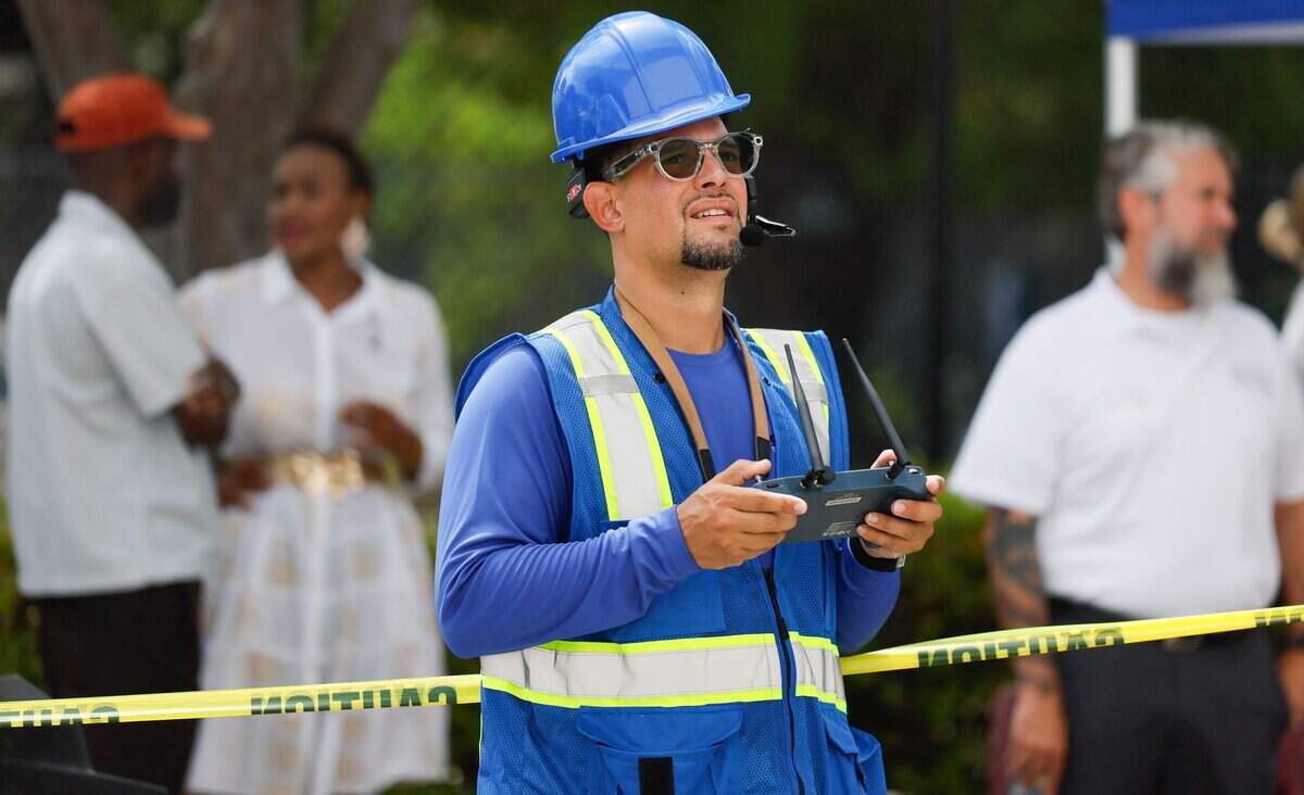 Drone pilot Manuel Varela flies a drone named Goodie 1 as Goodwill hosts a drone day at Goodwill Industries of South Florida, showcasing their aerial drone wash services for cleaning windows and walls on buildings and skyscrapers on Wednesday, July 15, 2026, in Miami, Florida.