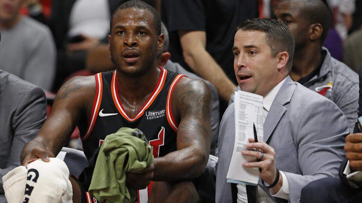 Miami Heat assistant coach Dan Craig talks with Heat guard Dion Waiters during the first quarter of an NBA basketball game against the Washington Wizards at the AmericanAirlines Arena in Miami on Wednesday, November 15, 2017.