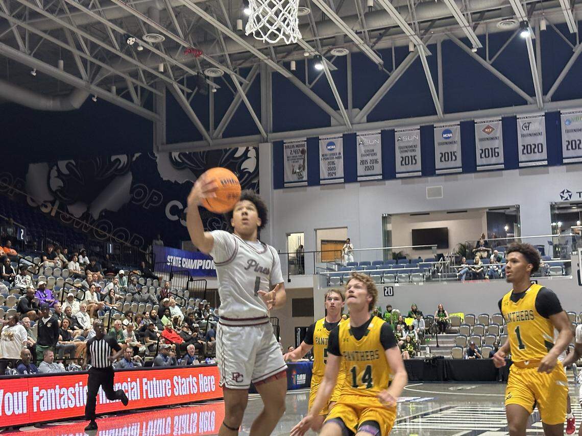 Pines Charter guard Adam Starr goes up for a layup during the Jaguars’ 65-32 win over Lecanto on Wednesday morning at UNF Arena in Jacksonville, Fla.
