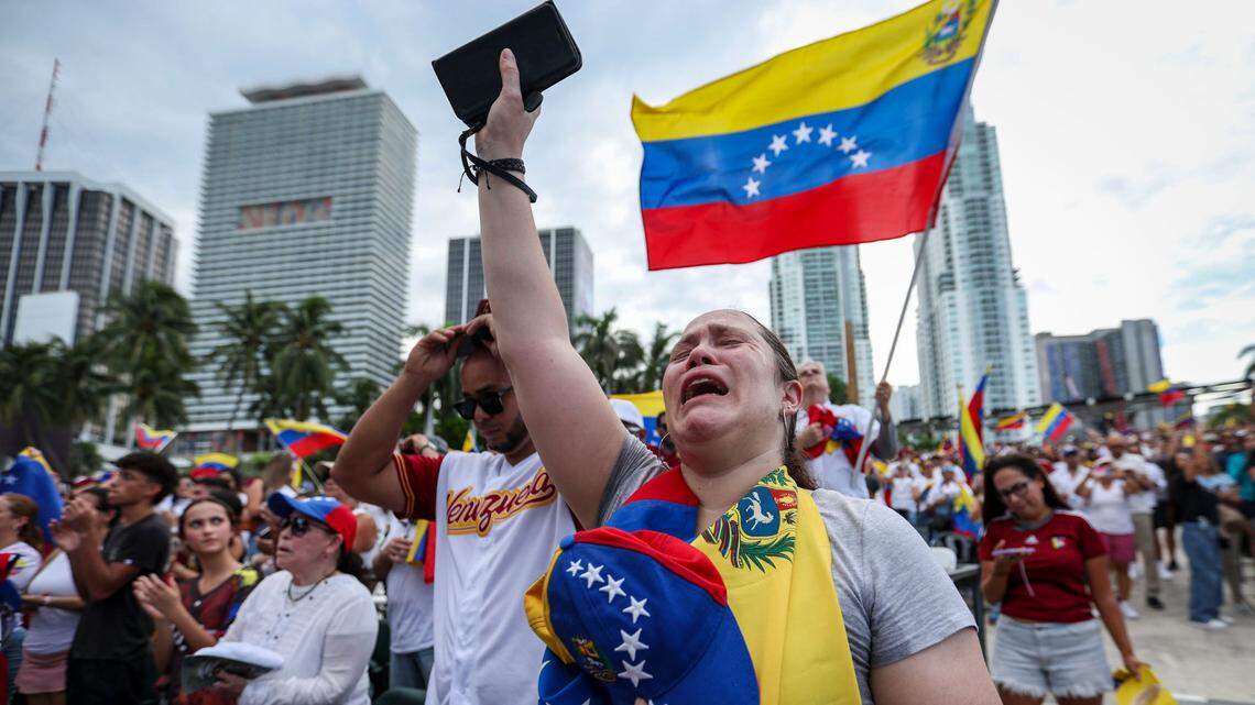 Blanca Solorzano weeps after having recited Venezuela’s national anthem