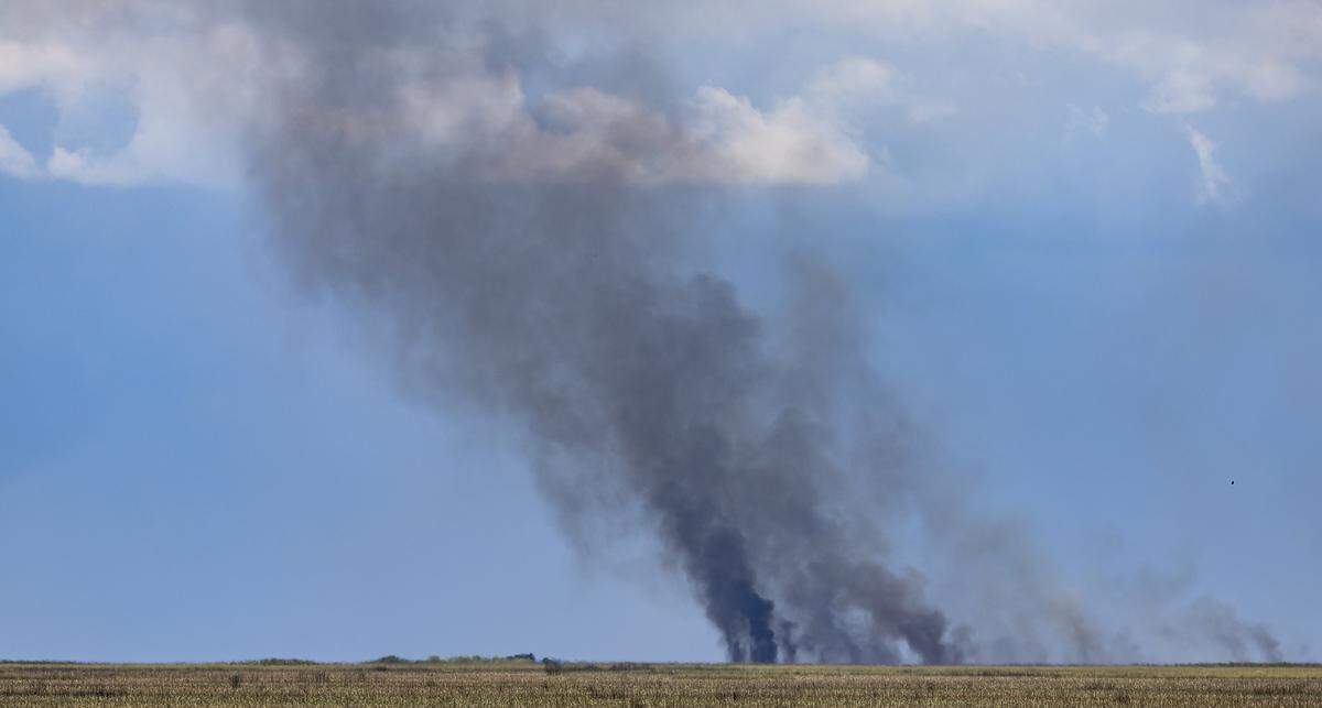 A view of an Everglades wildfire can be seen near US Highway 27 and Alligator Alley on Thursday, Aug. 21, 2025, in South Florida.