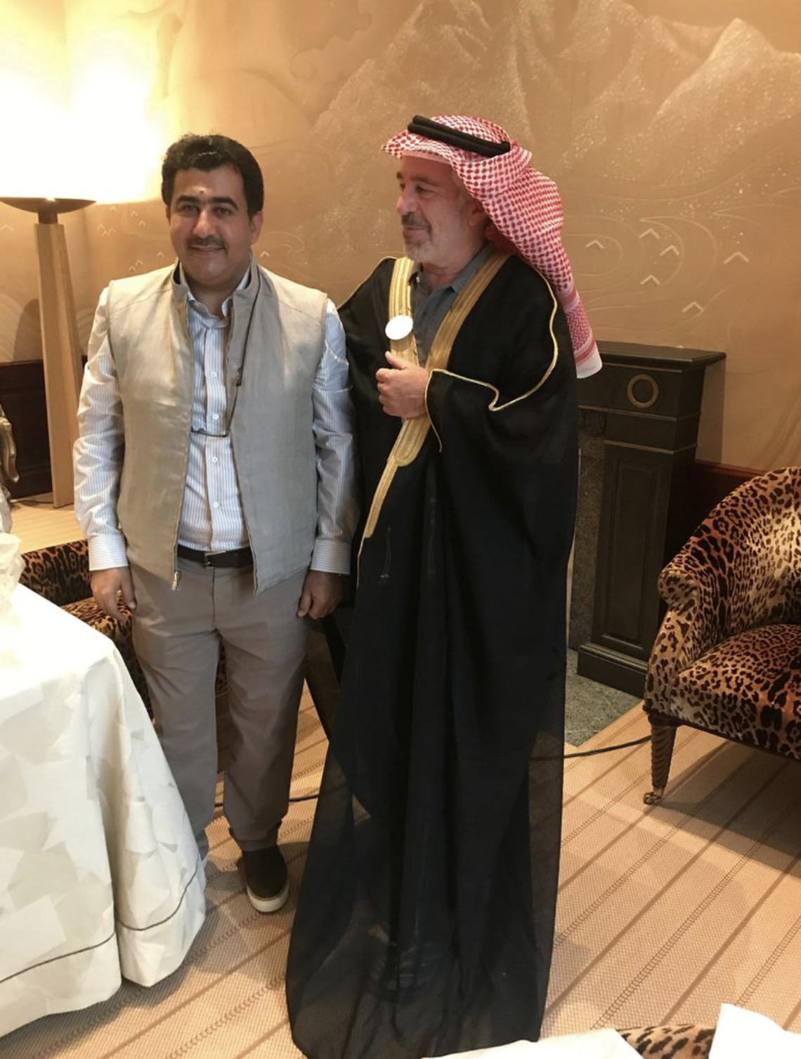 An undated photo released by the U.S. House Oversight Committee appears to show Jeffrey Epstein (R) in traditional Arab robes. The identity of the other man is unknown.