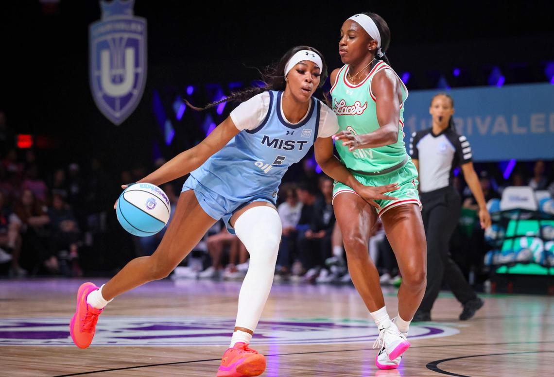 Mist BC’s Rickea Jackson (5) dribbles around Laces BC’s Jackie Young (0) during the 1-on-1 tournament for Unrivaled, a women’s pro basketball league that launched this season in Miami, on Monday, Feb. 10, 2025, at Wayfair Arena in Medley, Florida.