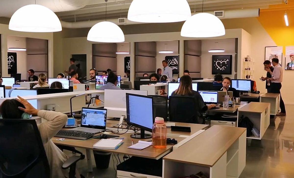 A typical workday inside the headquarters of OnPoint Global, an online content generator/data firm, located at 350 NE 60th Street in Little Haiti.