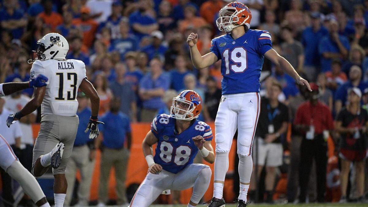 Florida place kicker Evan McPherson (19) watches after kicking a field goal against Charleston Southern Sept. 1, 2018.
