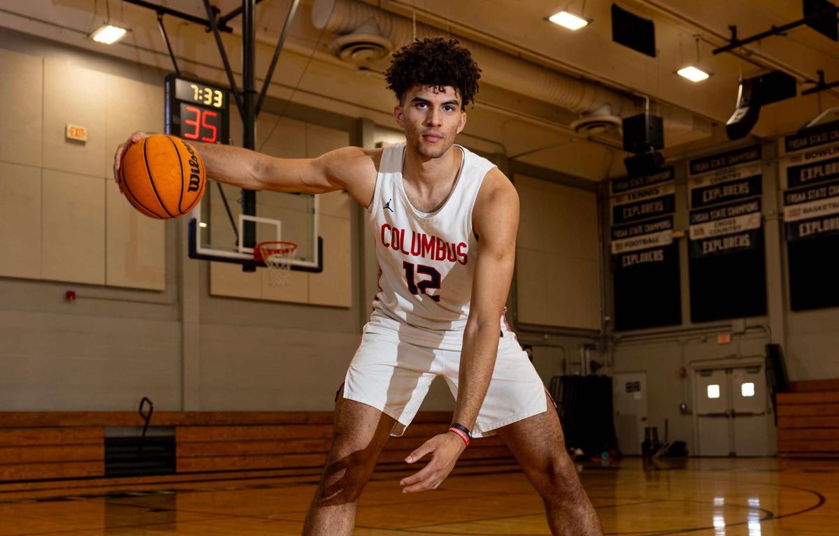 Columbus basketball player Cameron Boozer (12) strikes a pose for a portrait at Christopher Columbus High School on Thursday, March 20, 2025, in Miami, Florida.