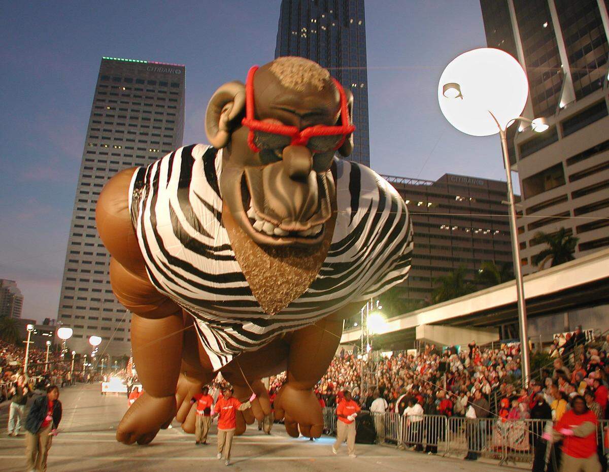 In this 2000 file photo, Gary the Gorilla is guided down Miami’s Biscayne Boulevard.