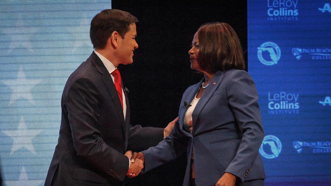 Sen. Marco Rubio, R-Fla., and U.S. Rep. Val Demings, D-Fla., greet each other before a televised debate at Duncan Theater on the campus of Palm Beach State College in Palm Beach County, Fla., on Tuesday, Oct. 18, 2022.