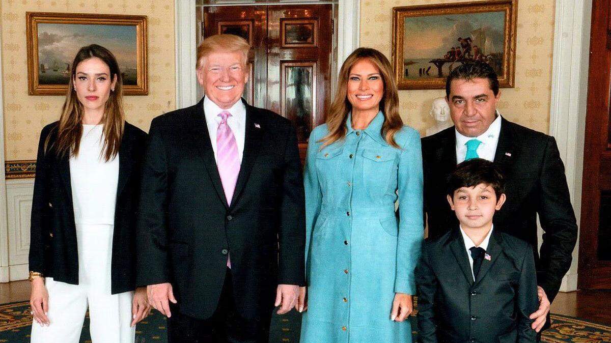 From left: Amanda Ungaro, President Donald Trump, first lady Melania Trump and Paolo Zampolli, along with the son over whose custody Ungaro and Zampolli are fighting over, in a photo taken at the White House and shared by Zampolli in 2019.