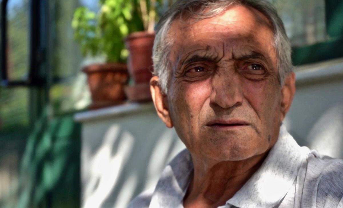 Jorgaq Subashi, 72, can glimpse the land he was awarded in 1993 as part of the Albanian government’s attempt to return property seized under communist rule but is yet to receive his property deeds. He and some fellow villagers allege that Artur Shehu has taken control of lands that belong to them.