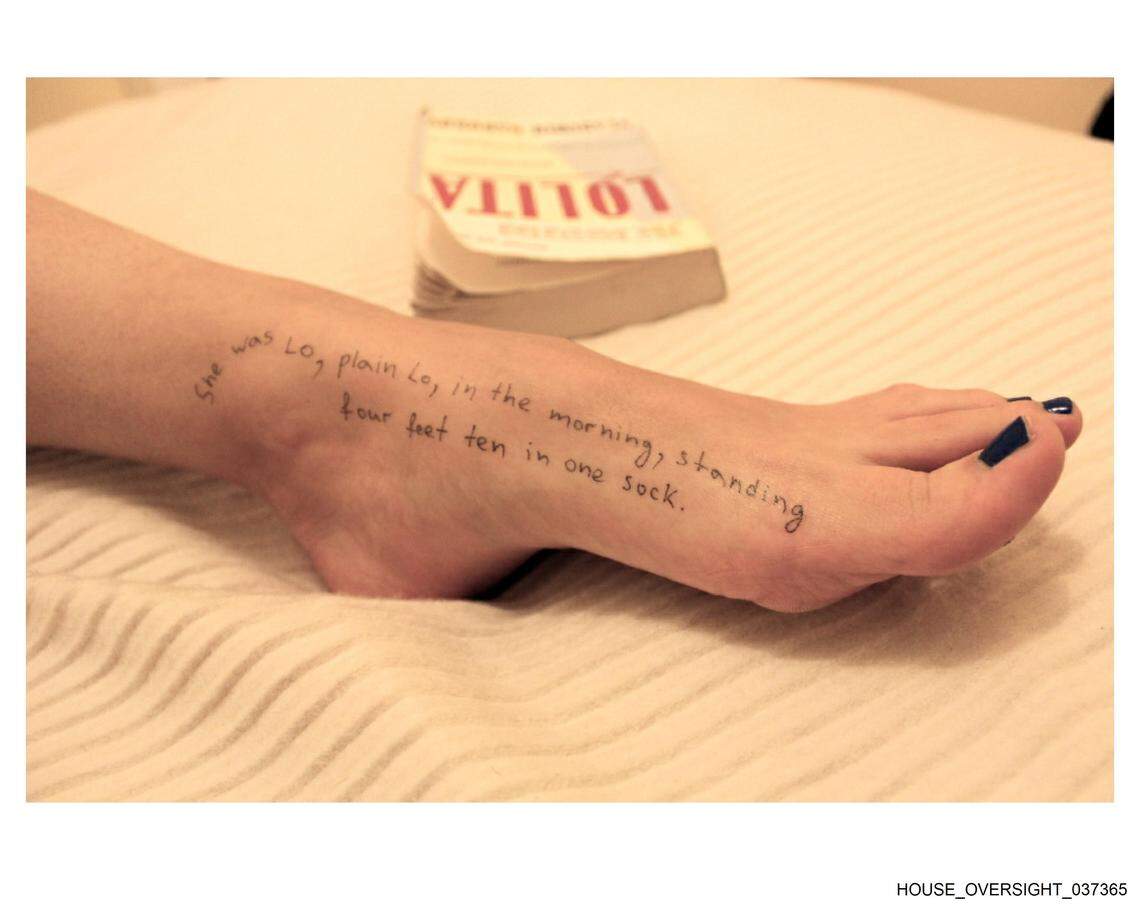 A quote, scribbled on a woman’s foot, was taken from Vladimir Nabokov’s 1955 novel, “Lolita.”