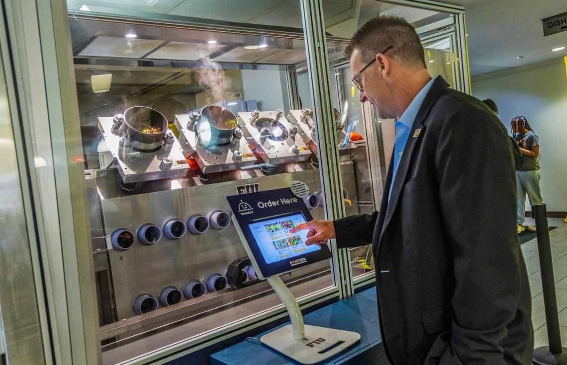 Roger Clegg, assistant vice president of business services at FIU, orders lunch from the culinary robot Beastro at FIU’s Eighth Street campus. He’s a fan of the chicken teriyaki and a sausage, peppers and onion pasta with spicy marinara.