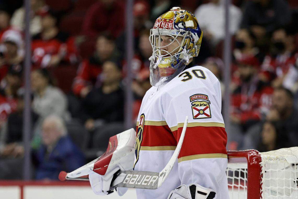 Florida Panthers goaltender Spencer Knight (30) reacts during the third period of an NHL hockey game against the New Jersey Devils on Tuesday, Nov. 9, 2021, in Newark, N.J. The Devils won 7-3. (AP Photo/Adam Hunger)