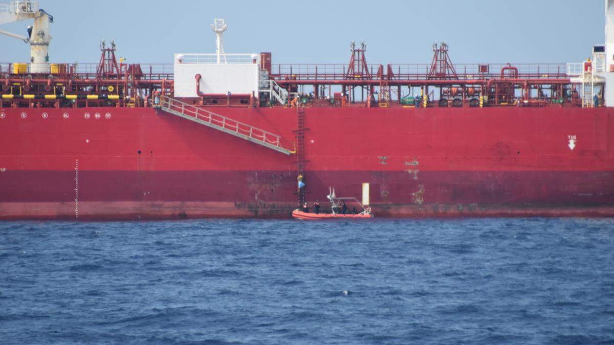 A Coast Guard Cutter Charles Sexton crew embarks a Cuban migrant from the motor tanker, STI Brixton, on April 22, 2021, about 70 miles southwest of Marathon. The Coast Guard Cutter Isaac Mayo crew repatriated two Cuban migrants on April 26, 2021.