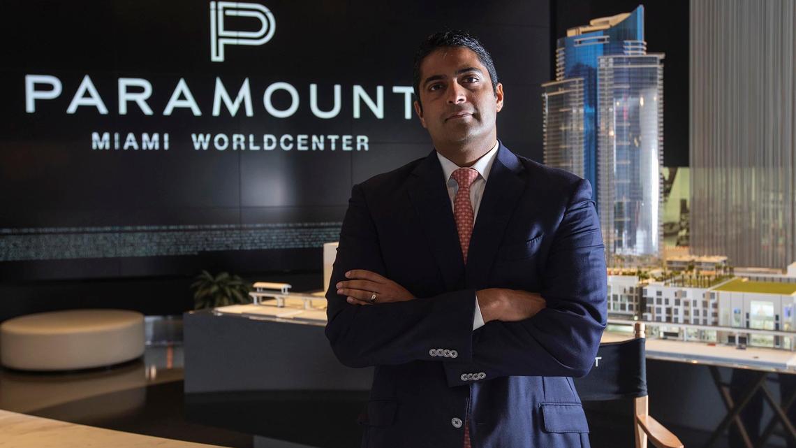Developer Nitin Motwani stands in front of a Miami Worldcenter scale model. Motwani has led the Downtown Development Authority’s efforts to bring finance — and, now, technology — firms to the city’s urban core.  