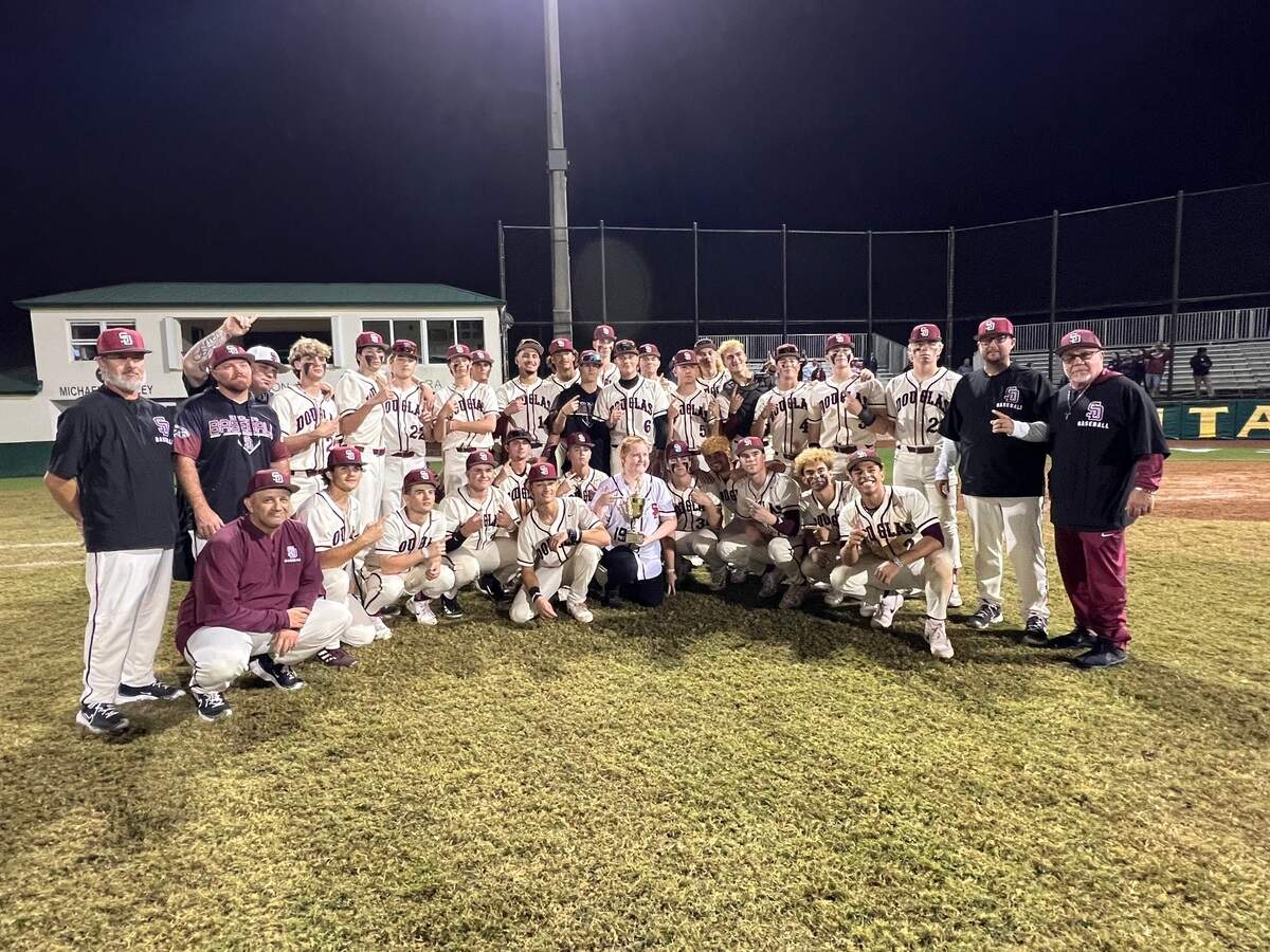 The Stoneman Douglas baseball team celebrates after beating West Broward 12-0 to win the BCAA championship on Friday at Nova High School in Davie, Fla.