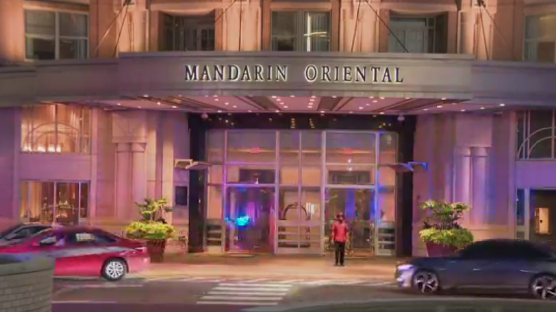 After a wife shot her husband at the Mandarin Hotel in Washington D.C., the husband has been arrested on sexual abuse against children charges, police say.