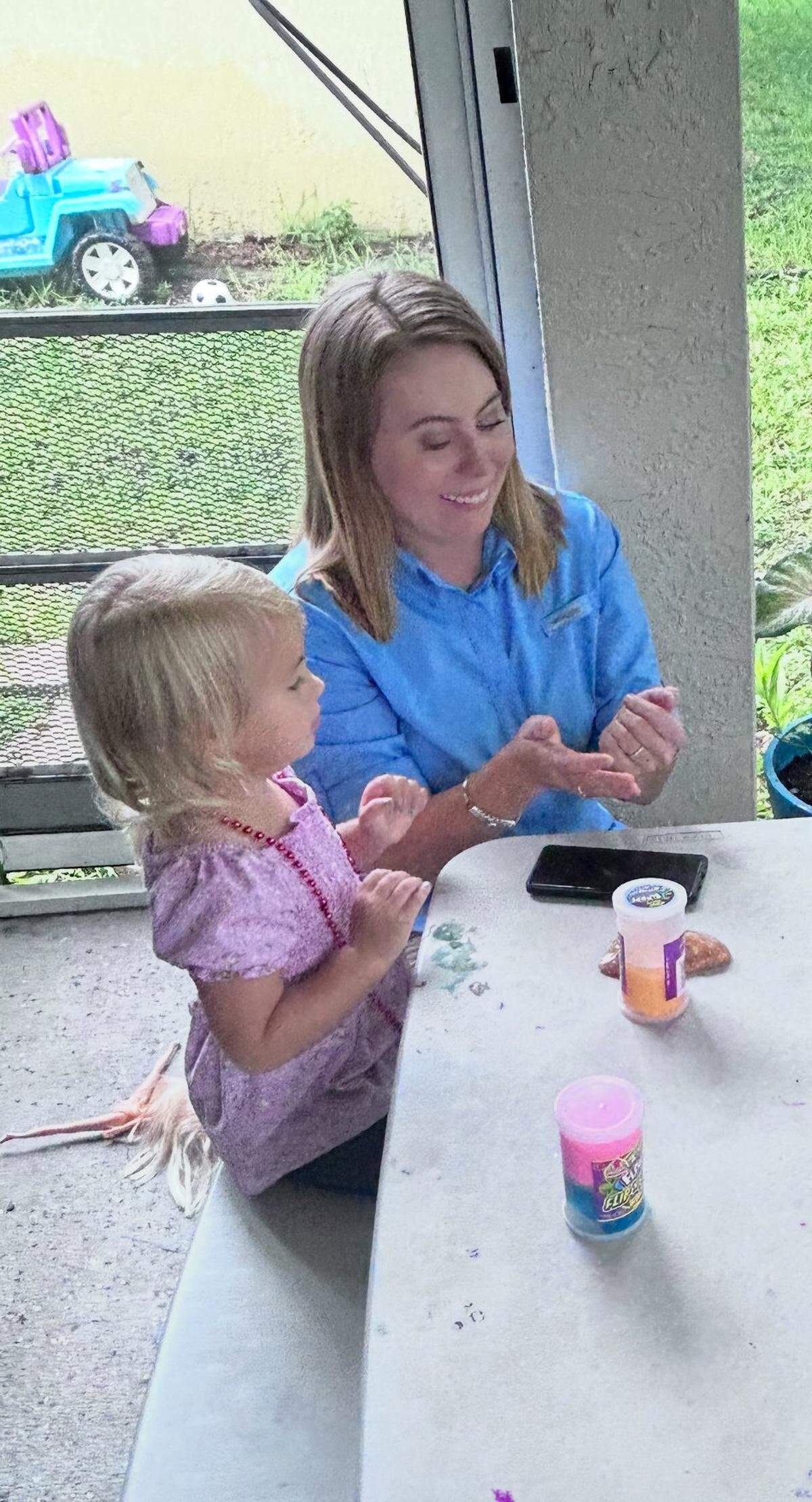 Mary Gingles plays with her daughter Seraphine in an undated photo. 