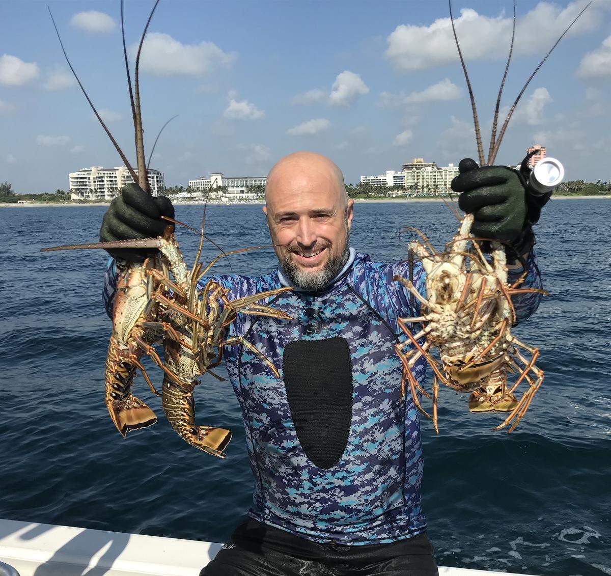 John Strunk of the Chiefy crew shows off some miniseason lobsters in July 2018.