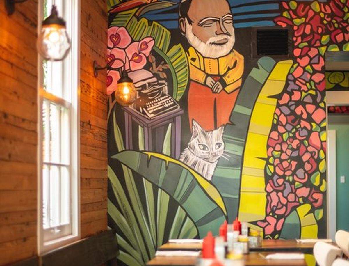 Moondog Cafet and Bakery has a colorful interior with murals.