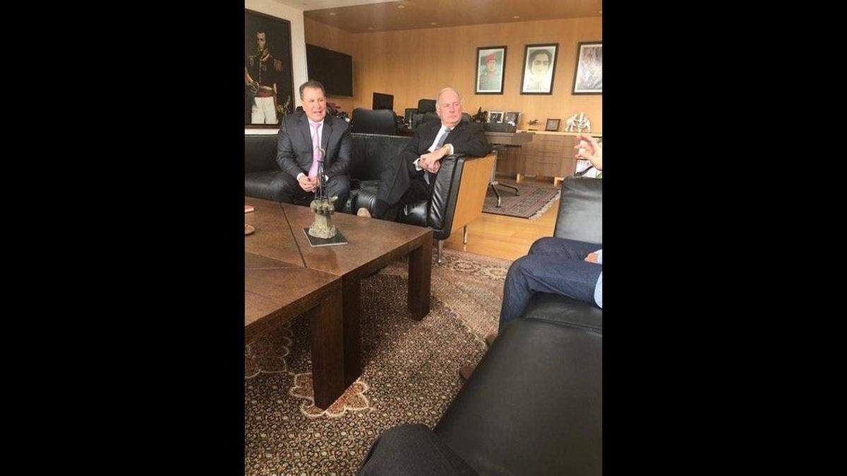 Miami businessman Hugo Perera, far left, and Gulf Stream magnate Harry Sargeant III, next to him on couch, meet with Manuel Quevedo, not fully seen on right, president of Venezuela’s state-owned oil company, PDVSA, in his Caracas office to discuss drilling deals with the Maduro government in this undated photo.