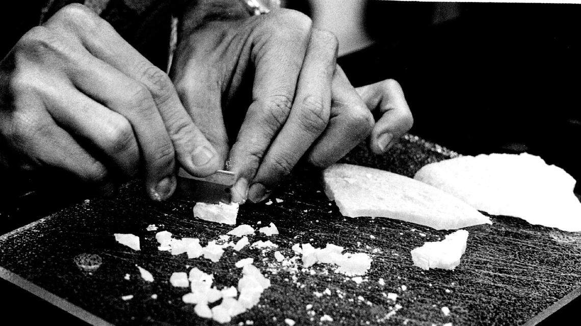 BSO Drug Chemist Randy Hilliard cuts up crack into small rocks that sell for $10 - $20.
