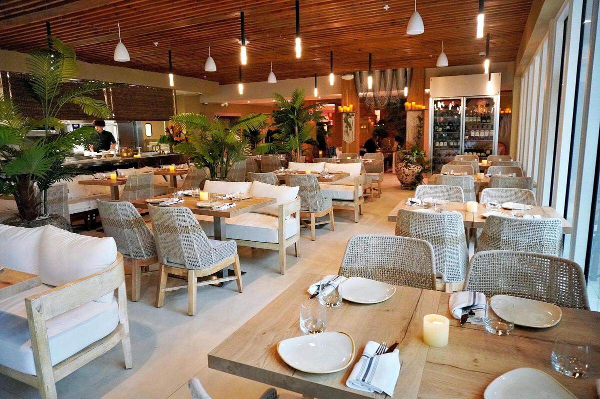 The indoor dining room at Pamplemousse on the Bay in Miami Beach.