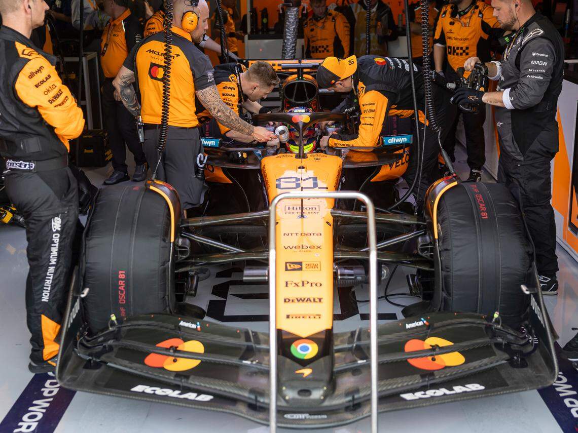 McLaren driver Oscar Piastri of Australia enters his car before the start of the Formula One Miami Grand Prix at the Miami International Autodrome on Sunday, May 4, 2025, in Miami Gardens, Fla.