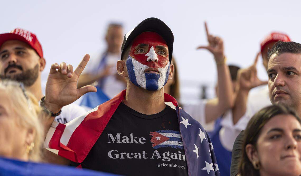 Iradiel Caraballo Viera forms an ‘L’ with his hand to symbolize liberty while attending the Free Cuba Rally at Milander Park on Tuesday, March 24, 2026, in Hialeah.