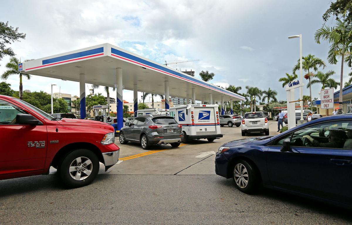 Cars line up for gasoline at a Marathon gas station at 21005 Biscayne Blvd. in this file photo from Aug. 30, 2019, in Aventura as people prepared for Hurricane Dorian.